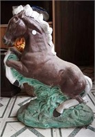Concrete horse, photo with boot to show size