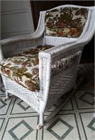 White wicker rocker, upholstered seat and back