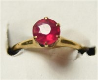 10kt gold ladies ring with simulated pink stone