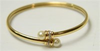 10kt gold ladies cuff bracelet with opal ends