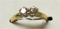 14kt gold ladies ring with two brilliant cut