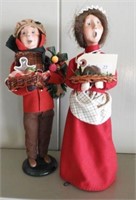 (2) Buyers Carolers Figurines: One with fruit