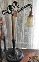 Antique brass and cast metal table lamp with