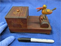 old wooden cigarette dispenser w/ helpful bird