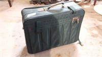 GREEN ROLLING SUITCASE 24" X 21" X 9"