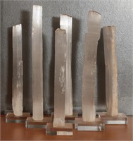 A GROUP OF 14 TO 17 INCH SELENITE ON LUCITE