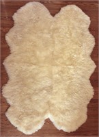 A SHEARLING AREA RUG