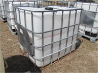 275 gal liquid storage tote HAS LID w/ metal cage
