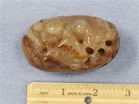 Interesting agate egg shaped stone, has relief car