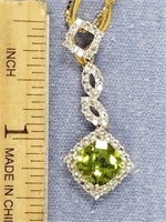 .925 silver peridot and white topaz pendant with 1