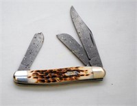 2 Case XX  Stag & bone handled knives with damascu