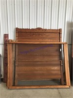 High-back wood bed frame w/ carving