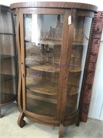 Curio Cabinet w/ curved glass; has key