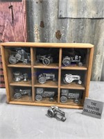 Small pewter tractor collection in showcase