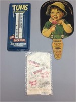 Tums tin advertising thermometer and fan