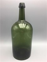 Large blown green bottle