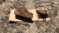 Two sets of cutting edges for excavator buckets