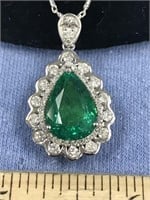 14K white gold ladies emerald and diamond pendent