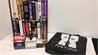 Pink Floyd seat cushion with group of VHS movies