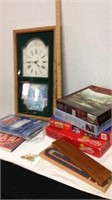 Wall clock with puzzles cribbage games cutting