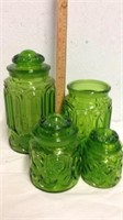 4 green glass canisters one missing lid