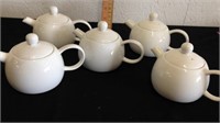 Five personal tea pots