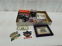 Racing collectibles including cards, decals, car
