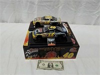 2 Matco Brooks and Dunn diecast cars both