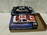 2 diecast collectible cars both new in package