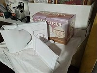 Compact meat slicer with original box