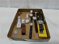 Variety of men's watches including Jurassic Park