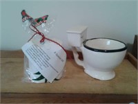 Coffee mug and toilet paper