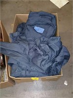 Box of work jumpsuits