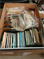 Box of postcards and pencils