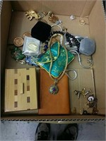 Box of costume jewelry some silver