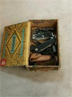 Cigar box of pocket knives