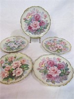 Group of 5 rose plates
