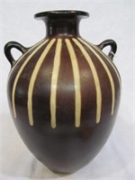 Handled pottery vase, Peru, signed