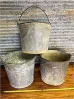 Three galvanized buckets