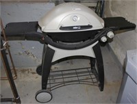 Weber gas grill w/side tables & cast iron griddle