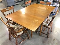 Willett solid cherry drop leaf table and chairs.