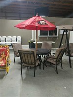 Patio Table with four chairs and cushions