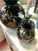 Two black Oriental vases