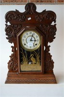 Antique American gingerbread shelf clock