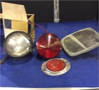 A box of assorted lights and mirrors