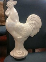 A white rooster wall decor