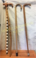 Lot of 3 canes - one carved with ball in middle