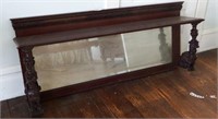 Antique buffet top mirror with unique carved