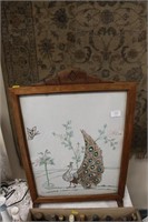 Embroidered fire screen