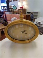 Yellow metal clock